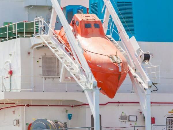 Lifeboat in gravity davits on a ship's side