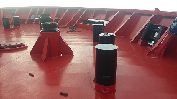 Bollards and fairleads on a ship's forecastle deck